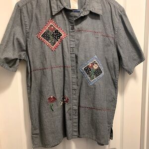 Women’s Denim Shirt with embroidery on the front.